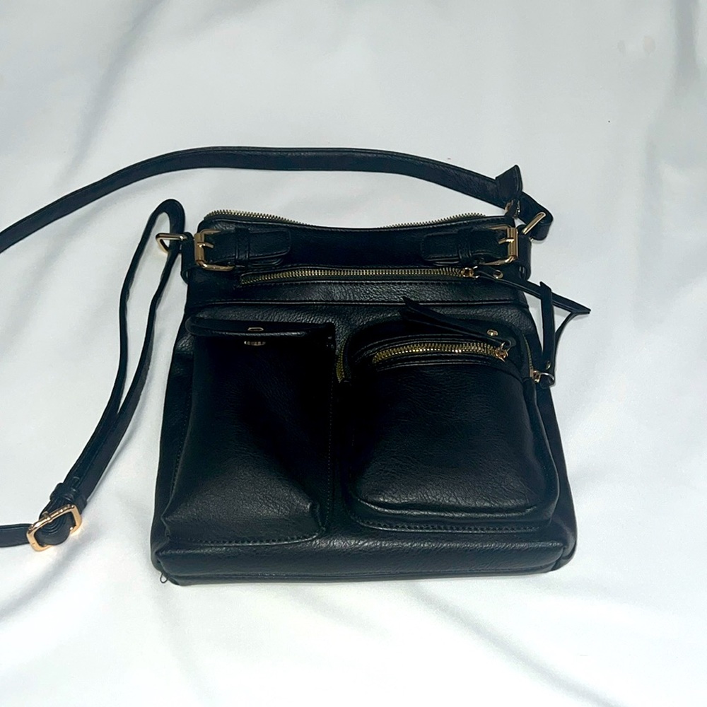Black Medium Lightweight Crossbody. In new like condition